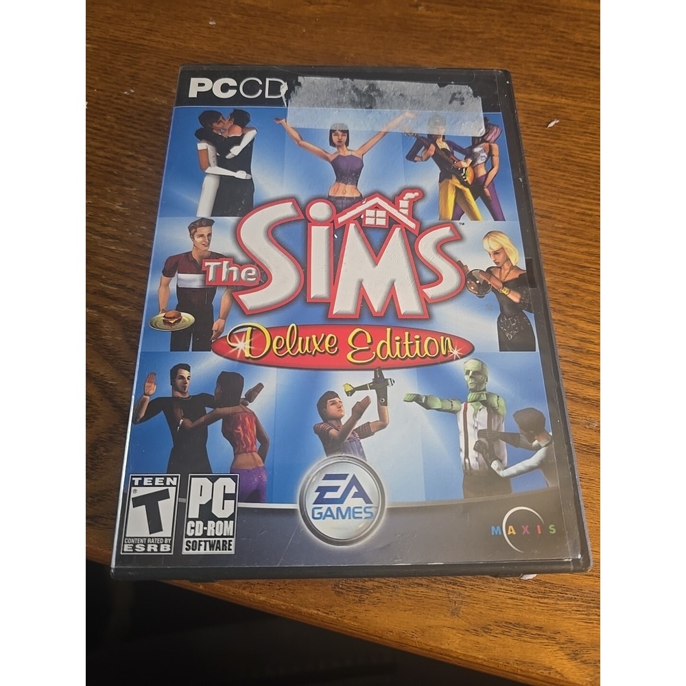 The Sims Deluxe Edition - Hard Case- PC 2005 CD-ROM - 2 Discs- Manual included